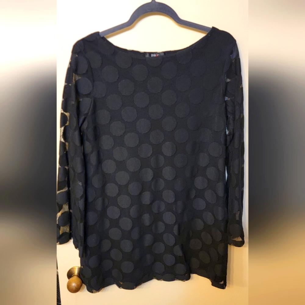 Black top ,long sleeves.